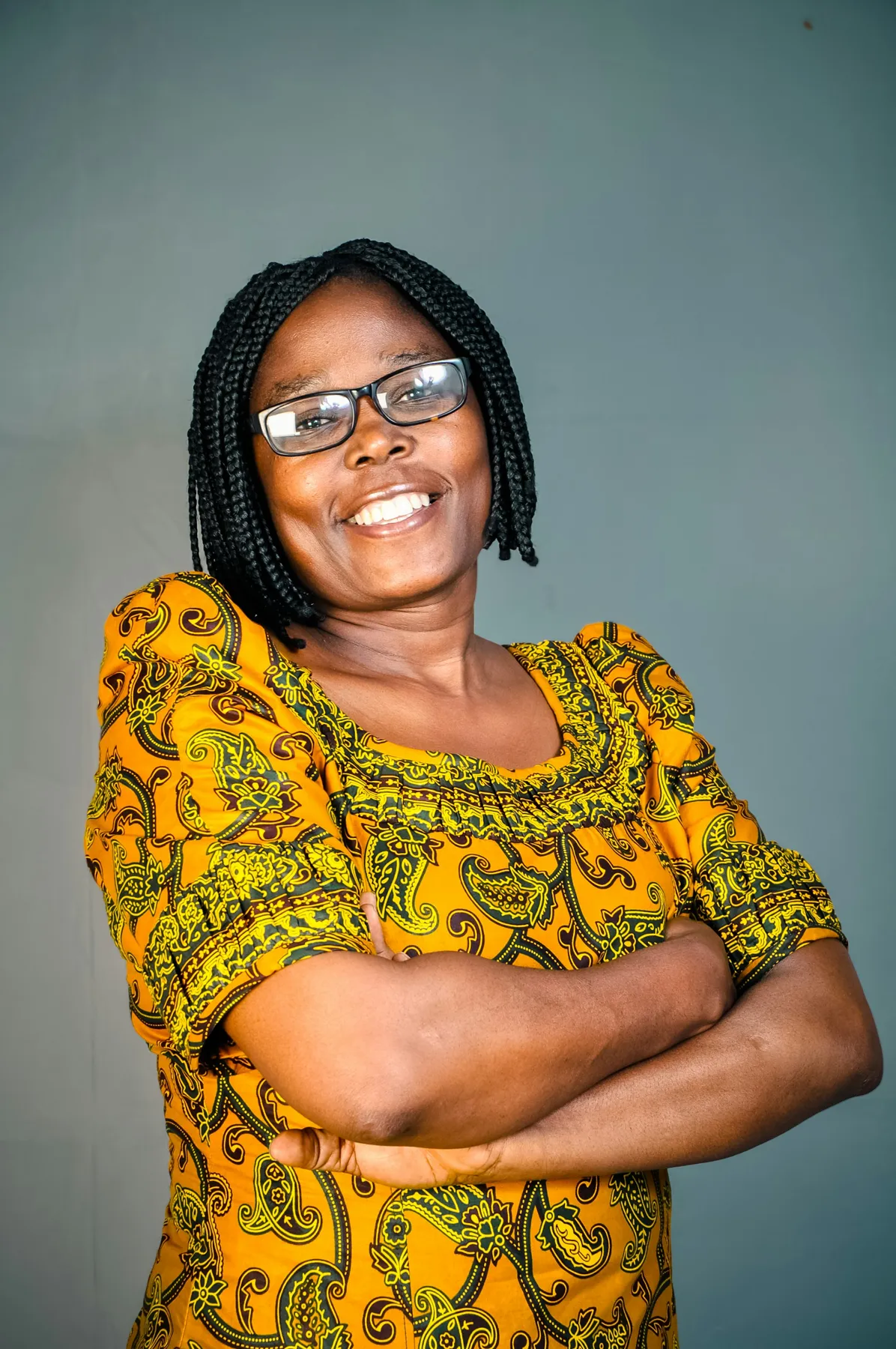 A lecturer smiling